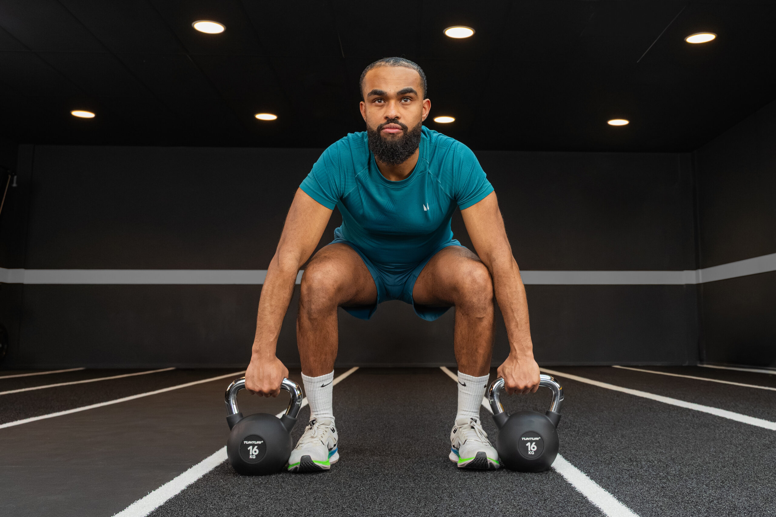 Tunturi Kettlebell - Platinum Rubber 4kg - Zwart Tunturi Kettlebell - Platinum Rubber 4kg - Zwart