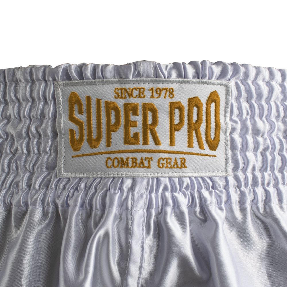 Super Pro Combat Gear Kickboksbroekje - Thai En Kickboksshort Brave - Goud / Wit Super Pro Combat Gear Kickboksbroekje - Thai En Kickboksshort Brave - Goud / Wit