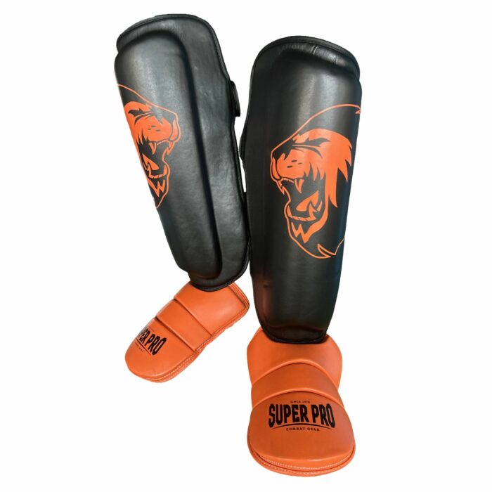 Super Pro Combat Gear Scheenbeschermer - Nations Holland kids PU - Zwart / Oranje