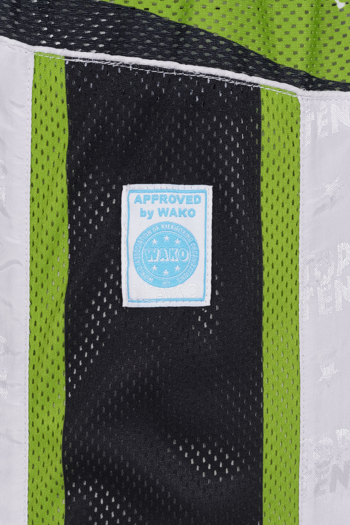 TOP TEN Kickboksuniform - Urban Arts - Wit / Groen TOP TEN Kickboksuniform - Urban Arts - Wit / Groen